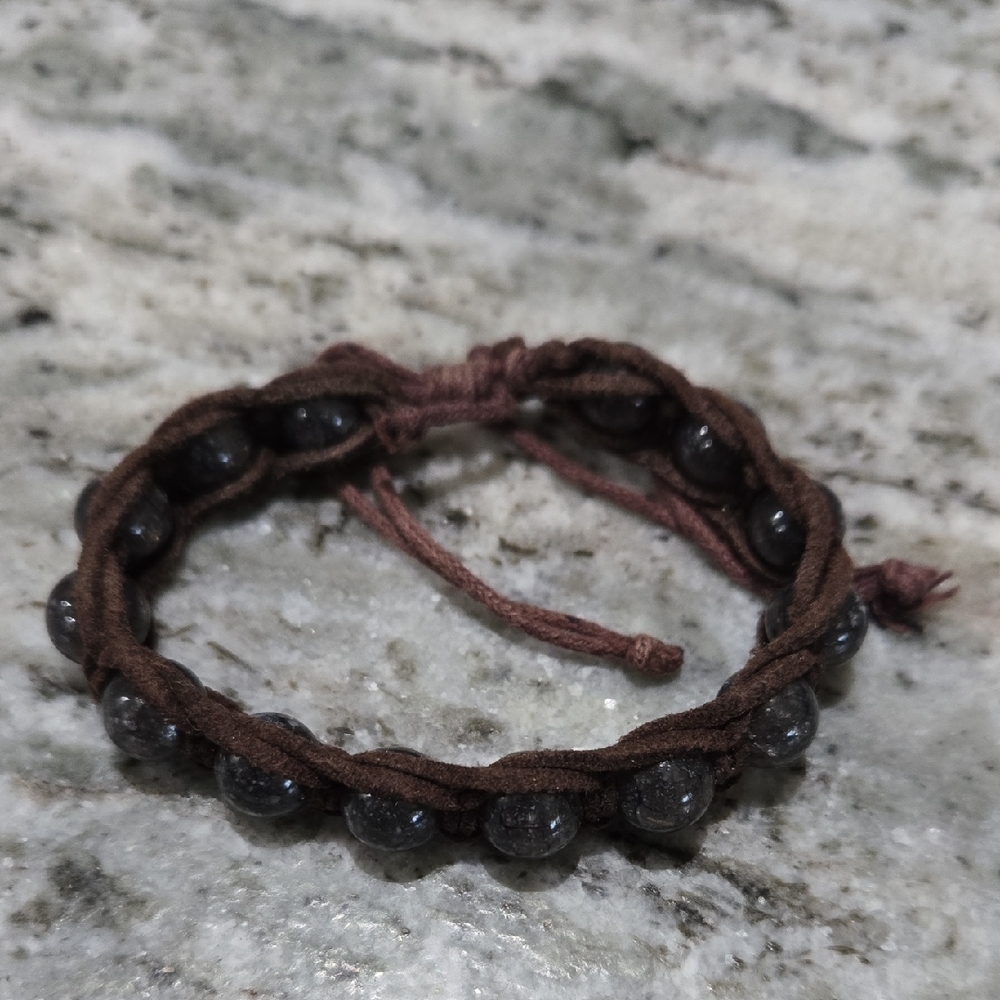 Handmade smoky quartz Shamballa-style macrame bracelet with a brown nylon cord. 